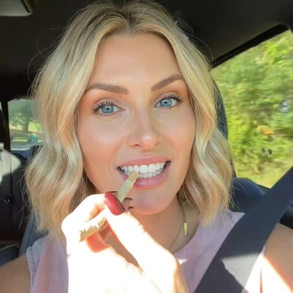 Jessica M. using Miswak